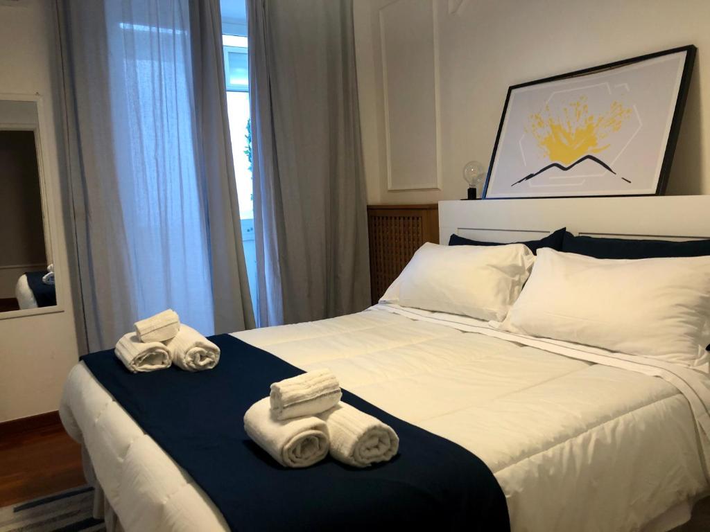 Camera con letto e asciugamani